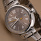 Montre Louis Vuitton - Montre Tambour Q1132 en acier 58 Facettes TOT-12030
