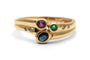 Bague 56 Bague contemporaine en or jaune 18 ct, émeraude, rubis, saphirs et diamants 58 Facettes B990