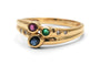 Bague 56 Bague contemporaine en or jaune 18 ct, émeraude, rubis, saphirs et diamants 58 Facettes B990