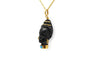Pendentif Pendentif des années 70 en or jaune 18 carats, ébène et turquoise 58 Facettes 24142