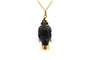 Pendentif Pendentif des années 70 en or jaune 18 carats, ébène et turquoise 58 Facettes 24142