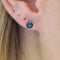 Boucles d'oreilles Boucles d’oreilles clous en or jaune 18k avec 2 saphirs 58 Facettes #4480