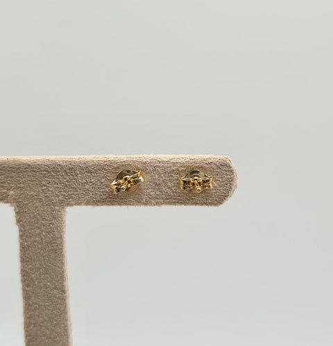 Boucles d'oreilles Boucles d’oreilles clous en or jaune 18k avec 2 saphirs 58 Facettes #4480