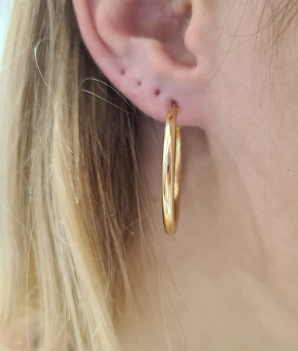 Boucles d'oreilles Créoles en or jaune 18k 58 Facettes #3948