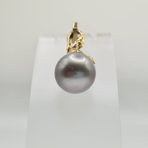 Pendentif Pendentif en or jaune 18 carats avec perle de Tahiti 58 Facettes #4499