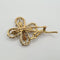 Broche Broche fleur en or jaune 18 carats avec diamant 58 Facettes #4505