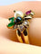 Bague 52 Bague en or jaune 18 carats, émeraudes, rubis, diamants et perles 58 Facettes AB759