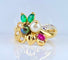 Bague 52 Bague en or jaune 18 carats, émeraudes, rubis, diamants et perles 58 Facettes AB759