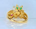 Bague 52 Bague en or jaune 18 carats, émeraudes, rubis, diamants et perles 58 Facettes AB759