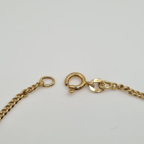 Bracelet Gourmette en or jaune 18 carats 58 Facettes #4584