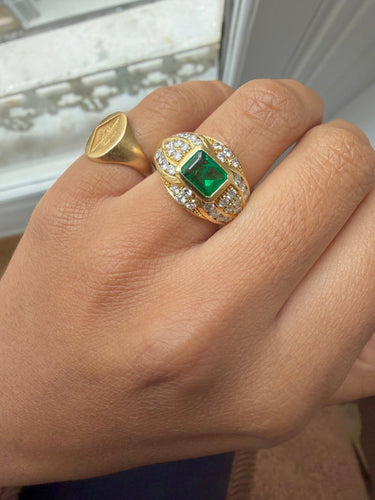 Bague 54 Bague bandeau en or jaune, émeraude et diamants 58 Facettes foapaf