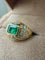 Bague 54 Bague bandeau en or jaune, émeraude et diamants 58 Facettes foapaf