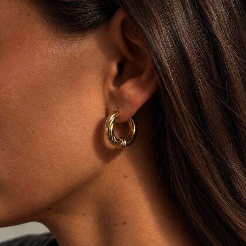 Boucles d'oreilles Créoles torsadées en or jaune et blanc 18 carats – Années 1990 58 Facettes