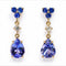 Boucles d'oreilles Boucles d’oreilles pendantes articulées en or jaune 14 carats, tanzanites, saphirs et diamants 58 Facettes E0067
