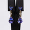 Boucles d'oreilles Boucles d’oreilles pendantes articulées en or jaune 14 carats, tanzanites, saphirs et diamants 58 Facettes E0067