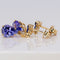 Boucles d'oreilles Boucles d’oreilles pendantes articulées en or jaune 14 carats, tanzanites, saphirs et diamants 58 Facettes E0067