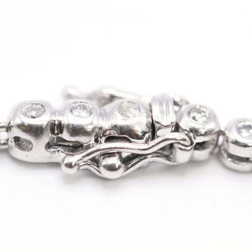 Bracelet Bracelet rivière en or blanc 18k avec diamants 1,50 ct 58 Facettes UKA000155GM