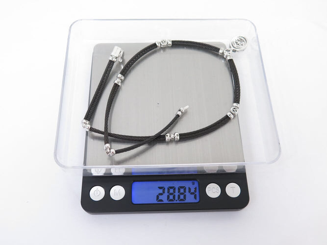 Collier CHARRIOL - Collier Celtique Ovale en acier noir et or blanc 18k, diamants 0,42 ct 58 Facettes 276036