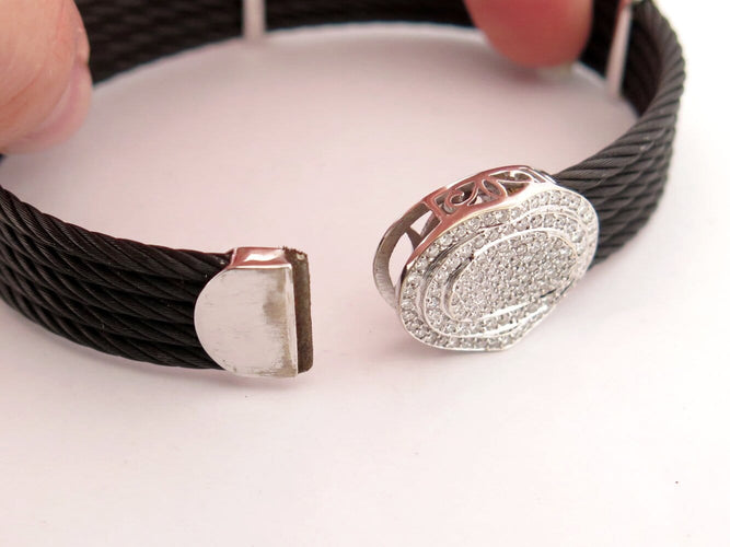 Bracelet ALOR2 / CHARRIOL - Bracelet Oval Station en acier noirci, or blanc 18k et diamants 0,65 ct 58 Facettes 276035