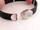 Bracelet ALOR2 / CHARRIOL - Bracelet Oval Station en acier noirci, or blanc 18k et diamants 0,65 ct 58 Facettes 276035