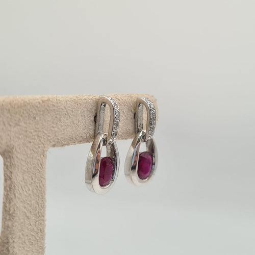 Boucles d'oreilles Boucles d’oreilles en or blanc 18k et rubis 58 Facettes #4886