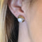 Boucles d'oreilles Boucles d’oreilles en or jaune et blanc avec perle 58 Facettes #5034