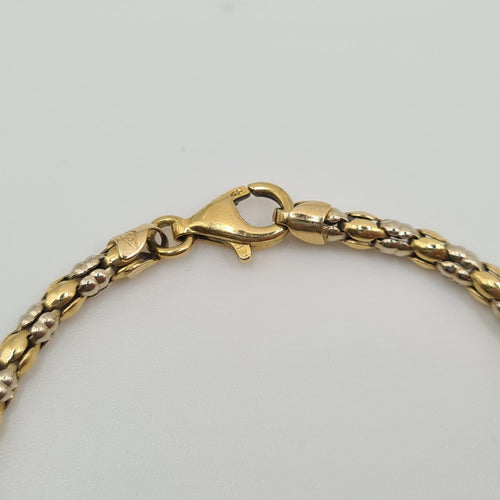 Bracelet Bracelet chaîne en or jaune 18k 58 Facettes #5035