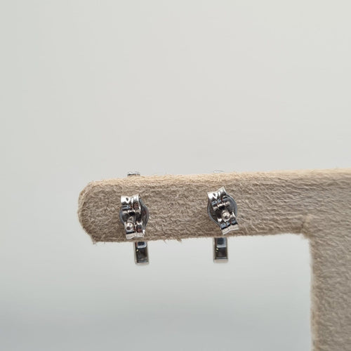 Boucles d’oreilles en or blanc 18k avec diamant naturel 58 Facettes #BT39