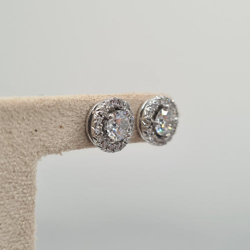 Boucles d’oreilles en or blanc 18k 58 Facettes #BT40