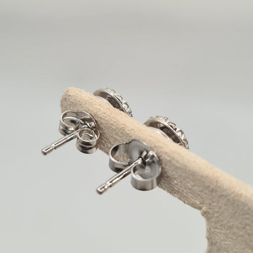 Boucles d’oreilles en or blanc 18k 58 Facettes #BT40