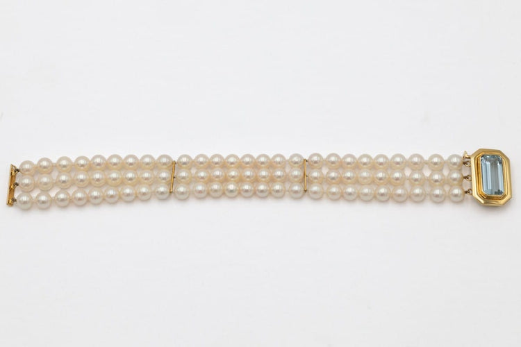 Bracelet à trois rangs de perles, fermoir en or jaune 18 carats et aigue-marine 58 Facettes 13445