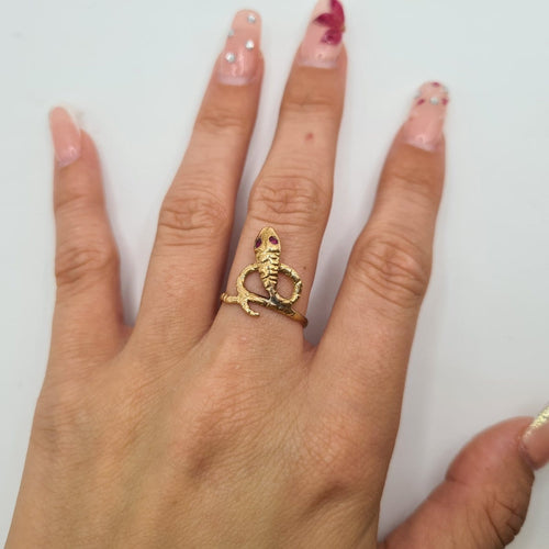 Bague serpent en or jaune 18k 58 Facettes #BT9