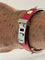 Bracelet Hermès - Bracelet Mini Dog en cuir de veau rouge 58 Facettes LOT 6841