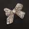 Broche Broche nœud en platine et diamants 58 Facettes LOT 6847