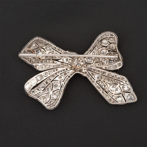Broche Broche nœud en platine et diamants 58 Facettes LOT 6847