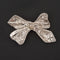 Broche Broche nœud en platine et diamants 58 Facettes LOT 6847