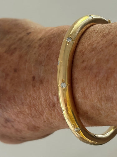 Bracelet Chaumet - Bracelet jonc ouvrant en or jaune 18k et diamants 58 Facettes LOT 7829