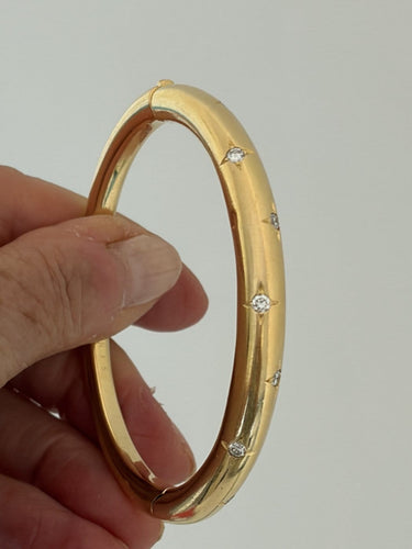 Bracelet Chaumet - Bracelet jonc ouvrant en or jaune 18k et diamants 58 Facettes LOT 7829