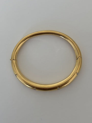Bracelet Chaumet - Bracelet jonc ouvrant en or jaune 18k et diamants 58 Facettes LOT 7829