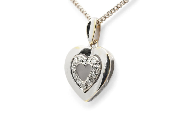 Pendentif Pendentif cœur en or blanc 18 carats et diamants taille brillant (env. 0,12 ct) 58 Facettes B978