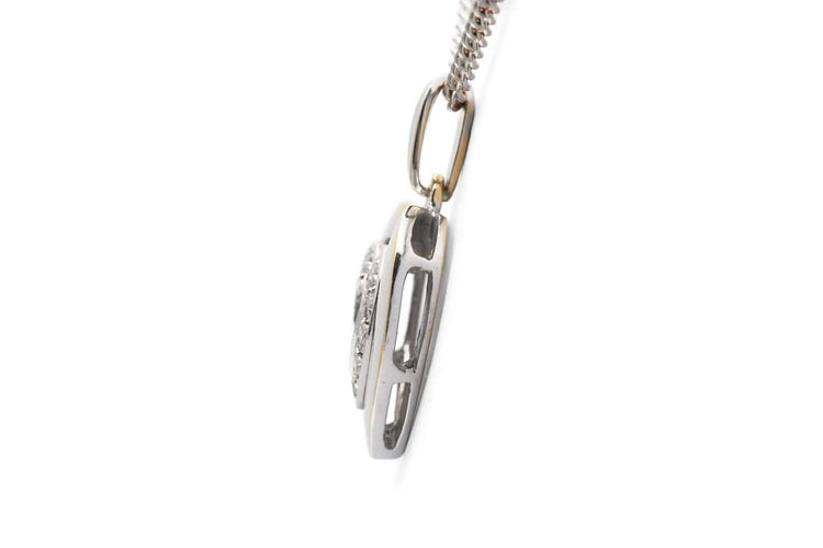 Pendentif Pendentif cœur en or blanc 18 carats et diamants taille brillant (env. 0,12 ct) 58 Facettes B978