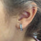Boucles d'oreilles Boucles d’oreilles créoles en or blanc 18 carats serties de diamants baguette – 0,70 ct 58 Facettes 2B-CC