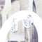Boucles d'oreilles Boucles d’oreilles créoles en or blanc 18 carats serties de diamants baguette – 0,70 ct 58 Facettes 2B-CC