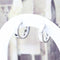 Boucles d'oreilles Boucles d’oreilles créoles en or blanc 18 carats serties de diamants baguette – 0,70 ct 58 Facettes 2B-CC