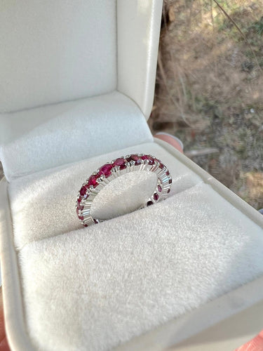 Bague 51.5 Alliance américaine en or gris 18 carats et rubis 58 Facettes 199