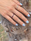 Bague 51.5 Alliance américaine en or gris 18 carats et rubis 58 Facettes 199