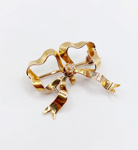 Broche Broche nœud en or 18k avec diamant taille ancienne, vers 1920 58 Facettes A08093