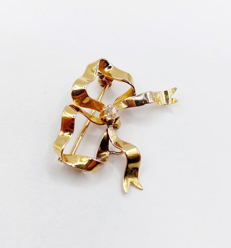Broche Broche nœud en or 18k avec diamant taille ancienne, vers 1920 58 Facettes A08093