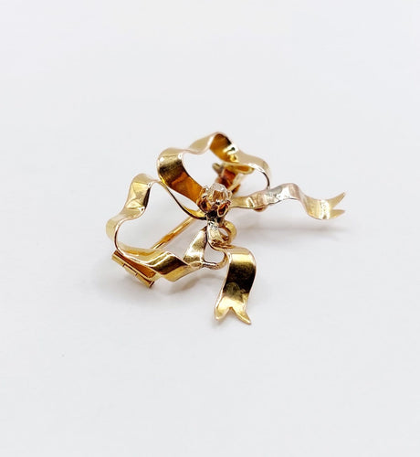 Broche Broche nœud en or 18k avec diamant taille ancienne, vers 1920 58 Facettes A08093