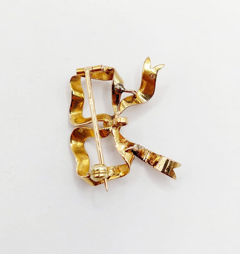 Broche Broche nœud en or 18k avec diamant taille ancienne, vers 1920 58 Facettes A08093